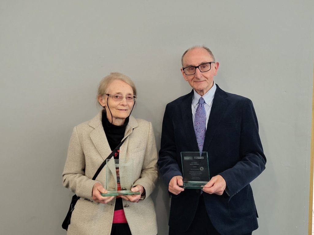 Peter and Julie with their award