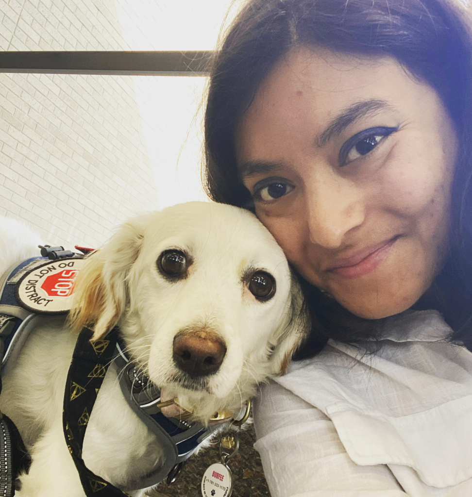 Bibhusha Karki taking a selfie with her dog Burfee