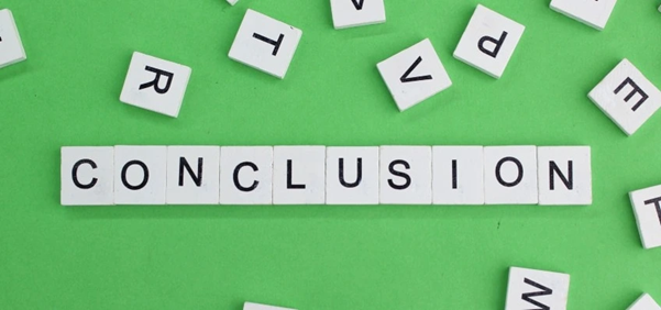 The word 'CONCLUSION' spelled out using individual letter tiles on a green background, with extra letter tiles scattered around.