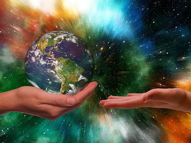 Hands holding the Earth